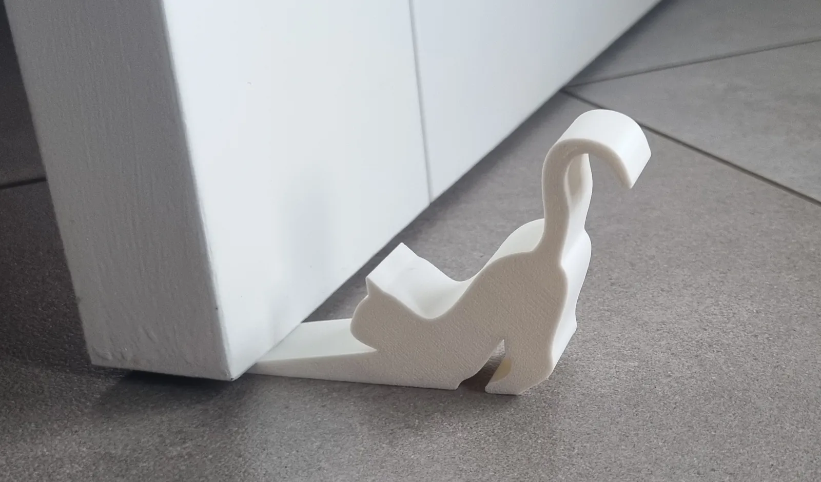 cale-porte en forme de chat