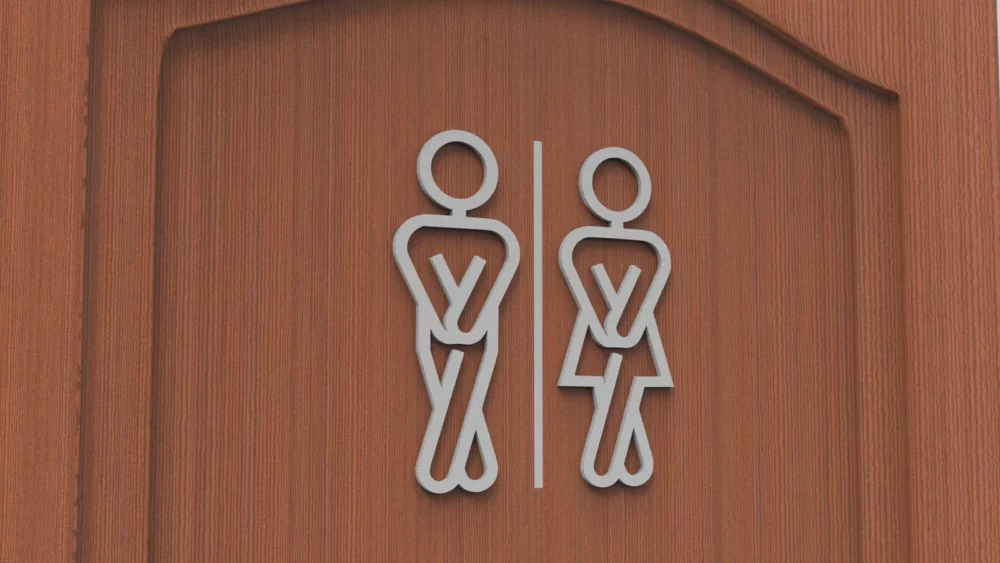 Plaque de porte de toilette